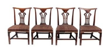 A set of four George III mahogany side chairs , circa 1770  A set of four George III mahogany side