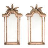 A pair of Continental giltwood and painted wall mirrors  A pair of Continental giltwood and