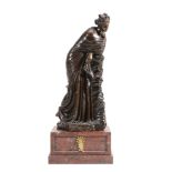 A French patinated bronze model of a maiden, third quarter 19th century  A French patinated bronze