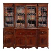 A Regency mahogany breakfront library bookcase, circa 1815, moulded cornice  A Regency mahogany