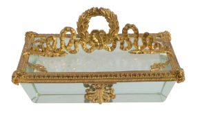 An Empire ormolu mounted cut glass desk weight, early 19th century  An Empire ormolu mounted cut