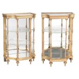 A neat pair of giltwood, glass, and mirrored shelves , 19th century and later  A neat pair of