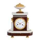 A French ormolu mounted red and white marble mantel clock, unsigned  A French ormolu mounted red and