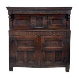 A Charles II oak press cupboard, circa 1660  A Charles II oak press cupboard,   circa 1660, the S