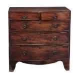 A mahogany bow fronted chest of drawers , first quarter 19th century  A mahogany bow fronted chest