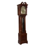 An Edwardian inlaid mahogany tubular bell quarter chiming eight-day longcase...  An Edwardian inlaid