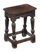 A Charles I oak joint stool , 17th century and later, the rectangular top with moulded edge above
