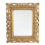 A Continental carved and gilt softwood framed wall mirror in 18th century taste  A Continental