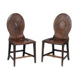 A matched pair Regency mahogany hall chairs , circa 1815  A matched pair Regency mahogany hall