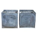A pair of lead garden planters, second half 20th century, of square section  A pair of lead garden