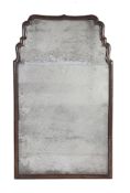 A mahogany framed wall mirror in Queen Anne style, late 19th century  A mahogany framed wall