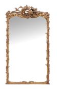 A Continental giltwood and composition wall mirror , 19th century  A Continental giltwood and