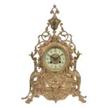 A French brass mantel clock, unsigned, early 20th century  A French brass mantel clock,