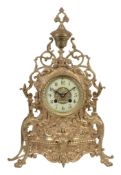 A French brass mantel clock, unsigned, early 20th century  A French brass mantel clock,