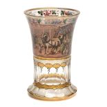 A Bohemian transparent-enamelled beaker decorated with an English coaching...  A Bohemian