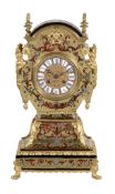 A French Boulle mantel clock in 'Tete de Poupe' style , Bon à Paris  A French Boulle mantel clock in