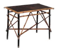 A Victorian black lacquer and bamboo table , circa 1890  A Victorian black lacquer and bamboo table