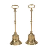 A pair of brass door porters, 19th century  A pair of brass door porters,   19th century ,   each