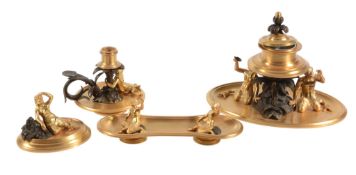 A Continental gilt and patinated metal four piece desk set, early 20th century  A Continental gilt