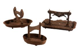 Three cast iron boot scrapes, first half 19th century  Three cast iron boot scrapes,   first half