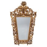 A Florentine carved giltwood wall mirror, 19th century  A Florentine carved giltwood wall