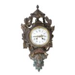 A French gilt bronze cartel timepiece , 19th century  A French gilt bronze cartel timepiece  ,