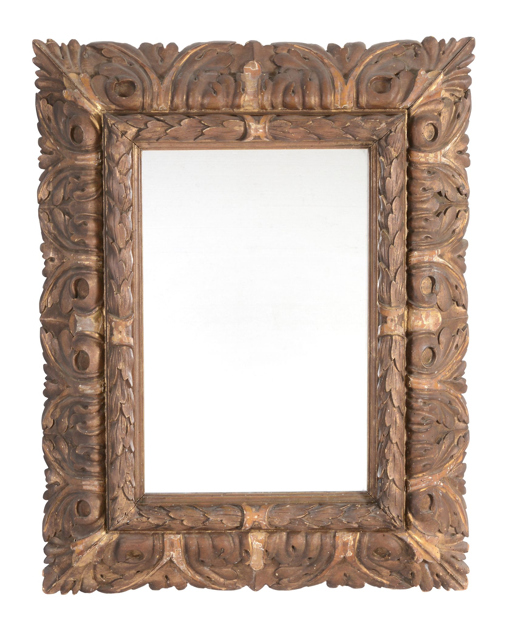 A Spanish carved and parcel giltwood framed wall mirror A Spanish carved and parcel giltwood