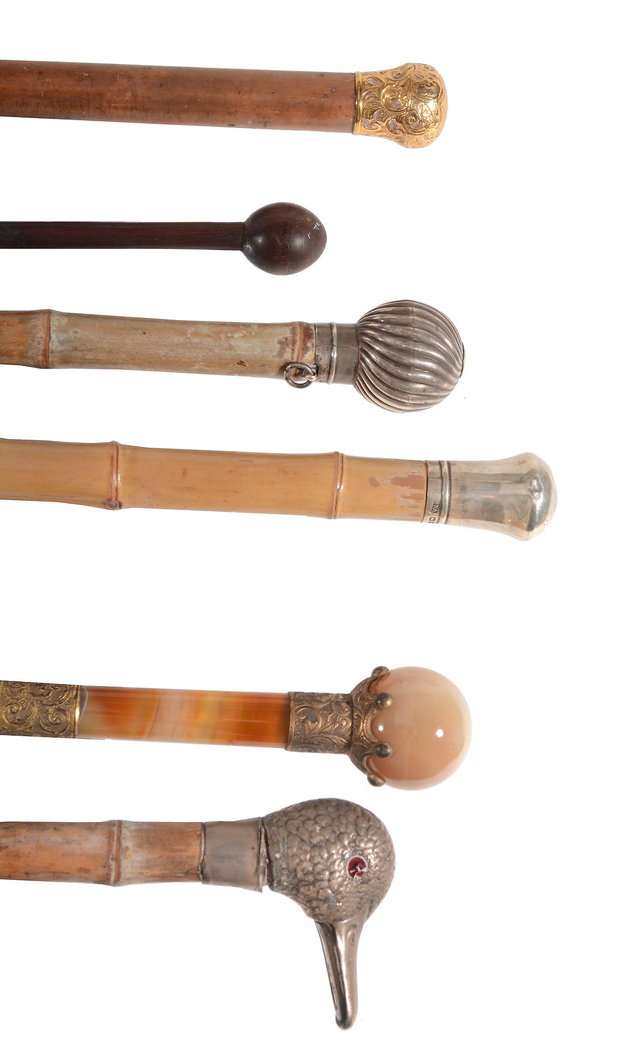 A collection of walking sticks and umbrellas, late 19th and early 20th century  A collection of - Image 2 of 3