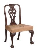 A George II mahogany side chair, circa 1750, the carved toprail above a decorative pierced splat,