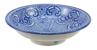An Iberian maiolica blue and white bowl, 20th century  An Iberian maiolica blue and white bowl,