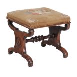 A William IV rosewood stool, circa 1835, with floral tapestry seat on...  A William IV rosewood