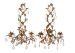 A pair of Continental gilt metal and cut glass hung three light wall appliques  A pair of