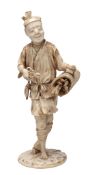 A sectional Ivory Okimono of a Woodsman, the figure stands on a circular...  A sectional Ivory
