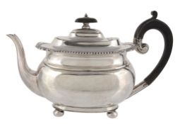 A silver oblong baluster tea pot by Harrison Brothers & Howson , Sheffield 1922  A silver oblong