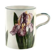 A large Wemyss tankard, circa 1900, painted with irises  A large Wemyss tankard,   circa 1900,
