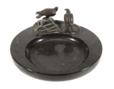 A patinated bronze and black marble vide poche, circa 1930  A patinated bronze and black marble vide