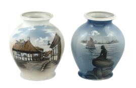 Two Royal Copenhagen porcelain vases, one with a village scene  Two Royal Copenhagen porcelain