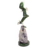 Lyle Sopel , a green nephrite carving of two eagles soaring, with other stones  Lyle Sopel (