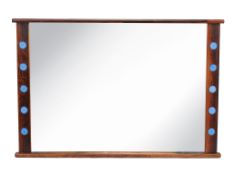 A Swedish rectangular wall mirror, 1970s, rosewood and ceramic, 74cm high  A Swedish rectangular