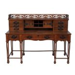 An Arts and Crafts oak and inlaid desk by Holland and Sons  An Arts and Crafts oak and inlaid desk