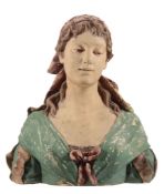 A Goldscheider terracotta bust of a young woman, a scarf around her head  A Goldscheider