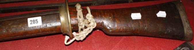 A 19th century small bore ship's gun, with a mahogany stock.117cm