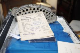 A collection of militaria documents, including photo albums and other items and a 1918 patented tank