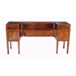 A George IV flame mahogany sideboard, circa 1825, the whole with ebonised string inlay, the stage