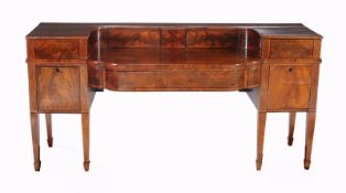 A George IV flame mahogany sideboard, circa 1825, the whole with ebonised string inlay, the stage