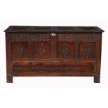 A Charles II oak mule chest, circa 1680, the quadruple panelled lid opening to large compartment,