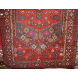 Three Middle Eastern rugs