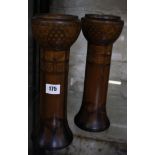 A pair of Art Nouveau Mahogany Ink Decorated Wooden 'Church Style' Candlesticks, 31cm high