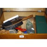 A quantity of collectable items to include games, bottle openers, AA badge etc in a wooden box