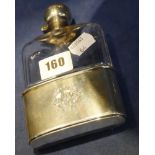 An Edwardian facetted glass hip flask with hinged silver stopper and mount, the silver Sheffield